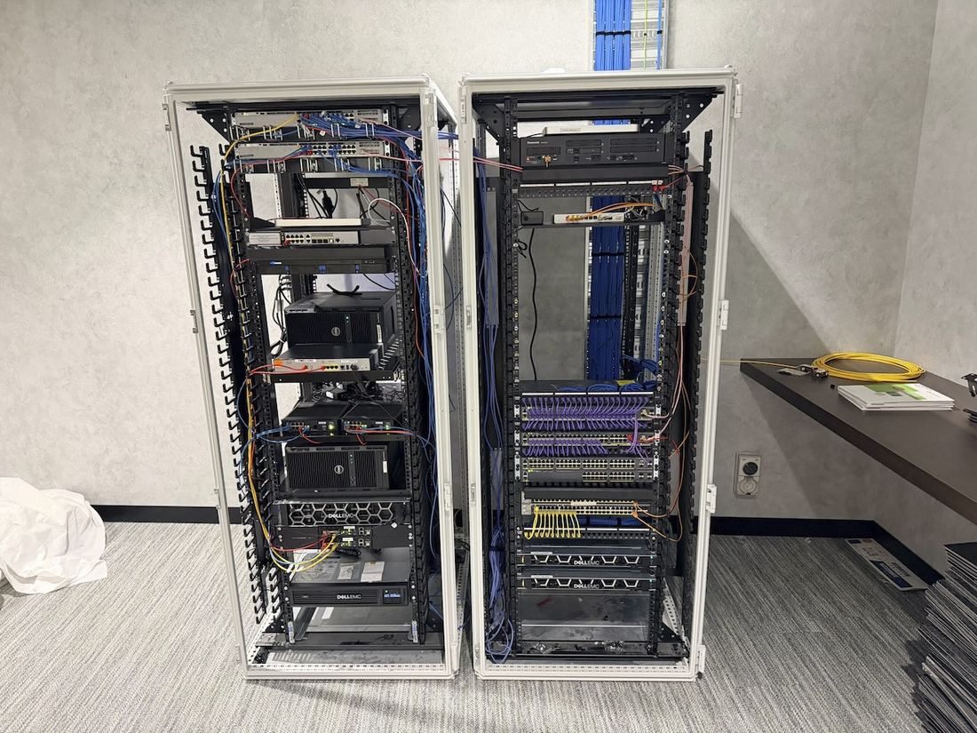 The same comms rack after remediation - re-terminated, dressed, labelled and certified