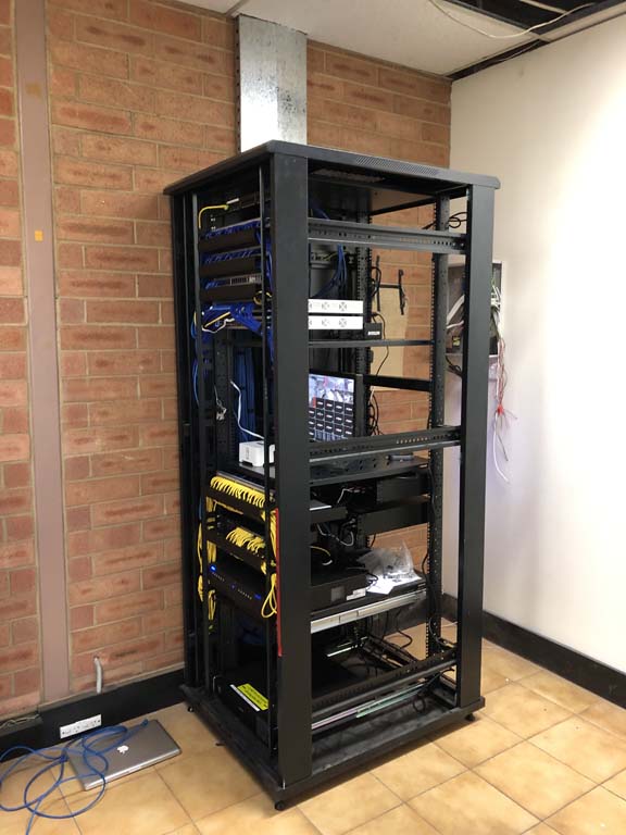 At the end of 5km worth of cable, you will find this naked communication cabinet, internet/networking/audio/camera gear live here. Electrical and Data Networks installs and commissions all of it.